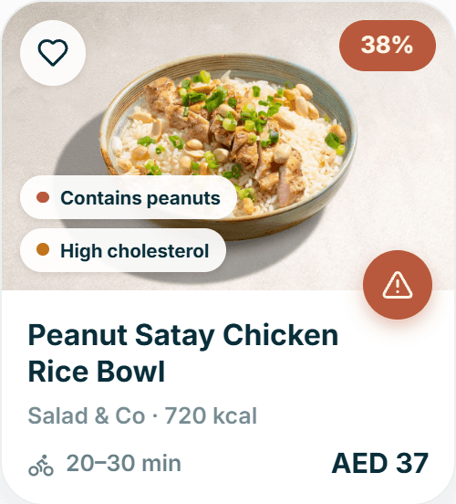 A dish card carrying peanut and cholesterol warning tags